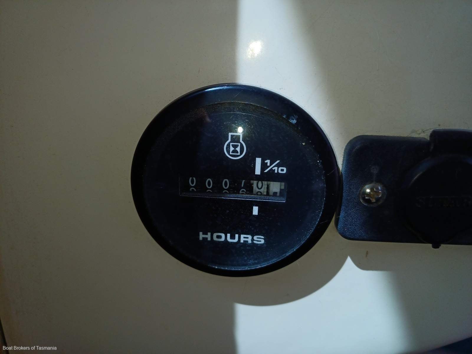 Caribbean Reef Runner 21. Only 7 engine hours on late model Mercruiser. Boat Brokers of Tasmania