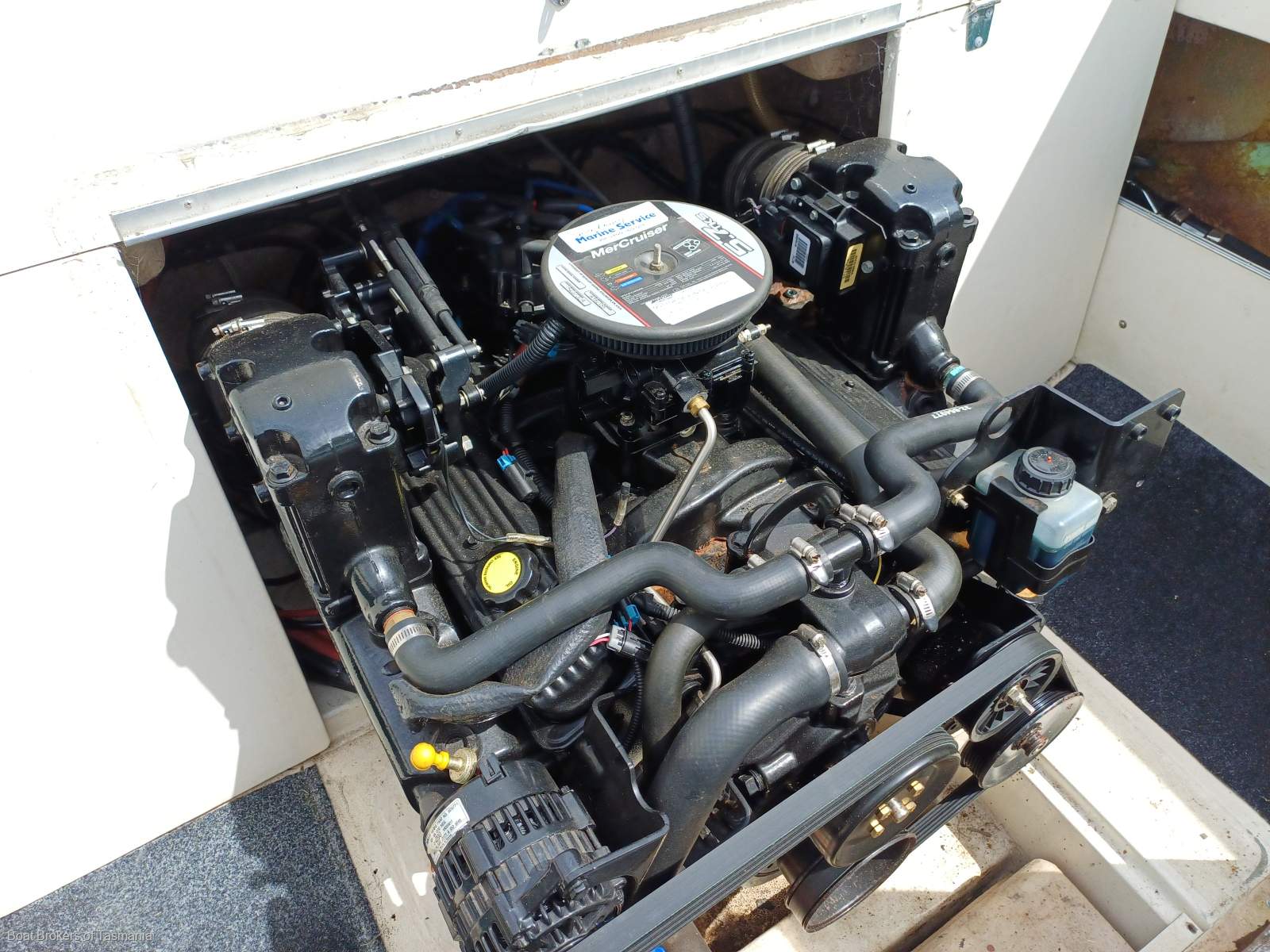 Caribbean Reef Runner 21. Only 7 engine hours on late model Mercruiser. Boat Brokers of Tasmania