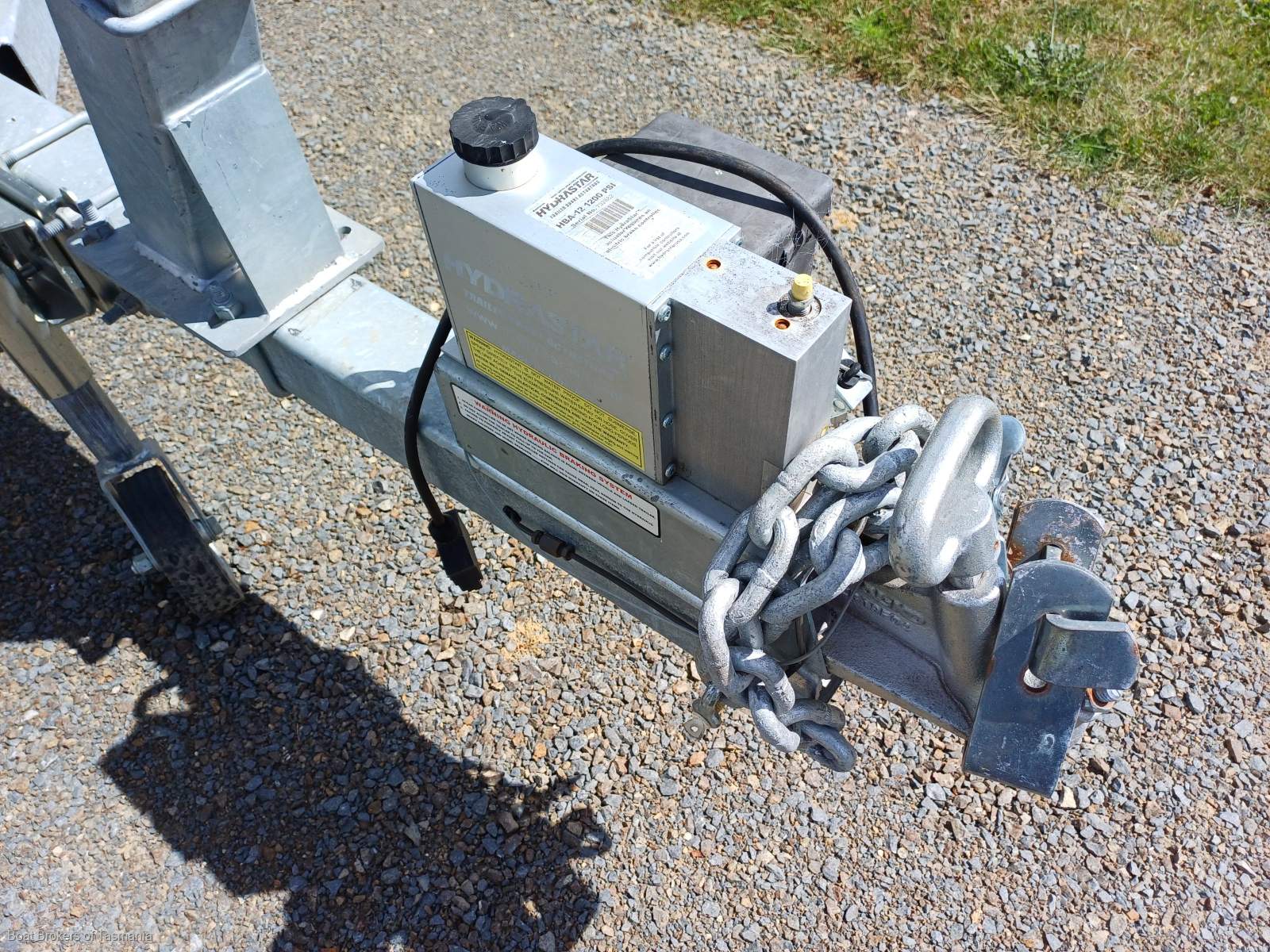 Caribbean Reef Runner 21. Only 7 engine hours on late model Mercruiser. Boat Brokers of Tasmania