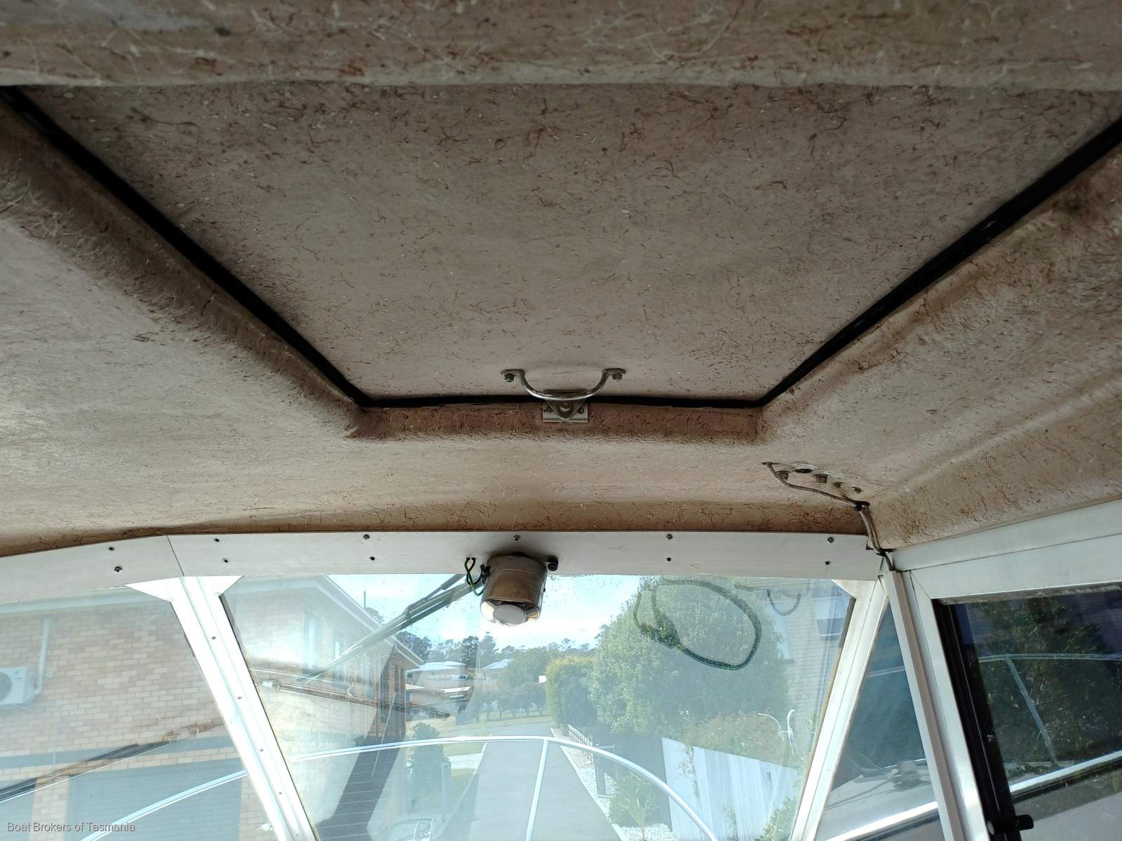 Caribbean Reef Runner 21. Only 7 engine hours on late model Mercruiser. Boat Brokers of Tasmania