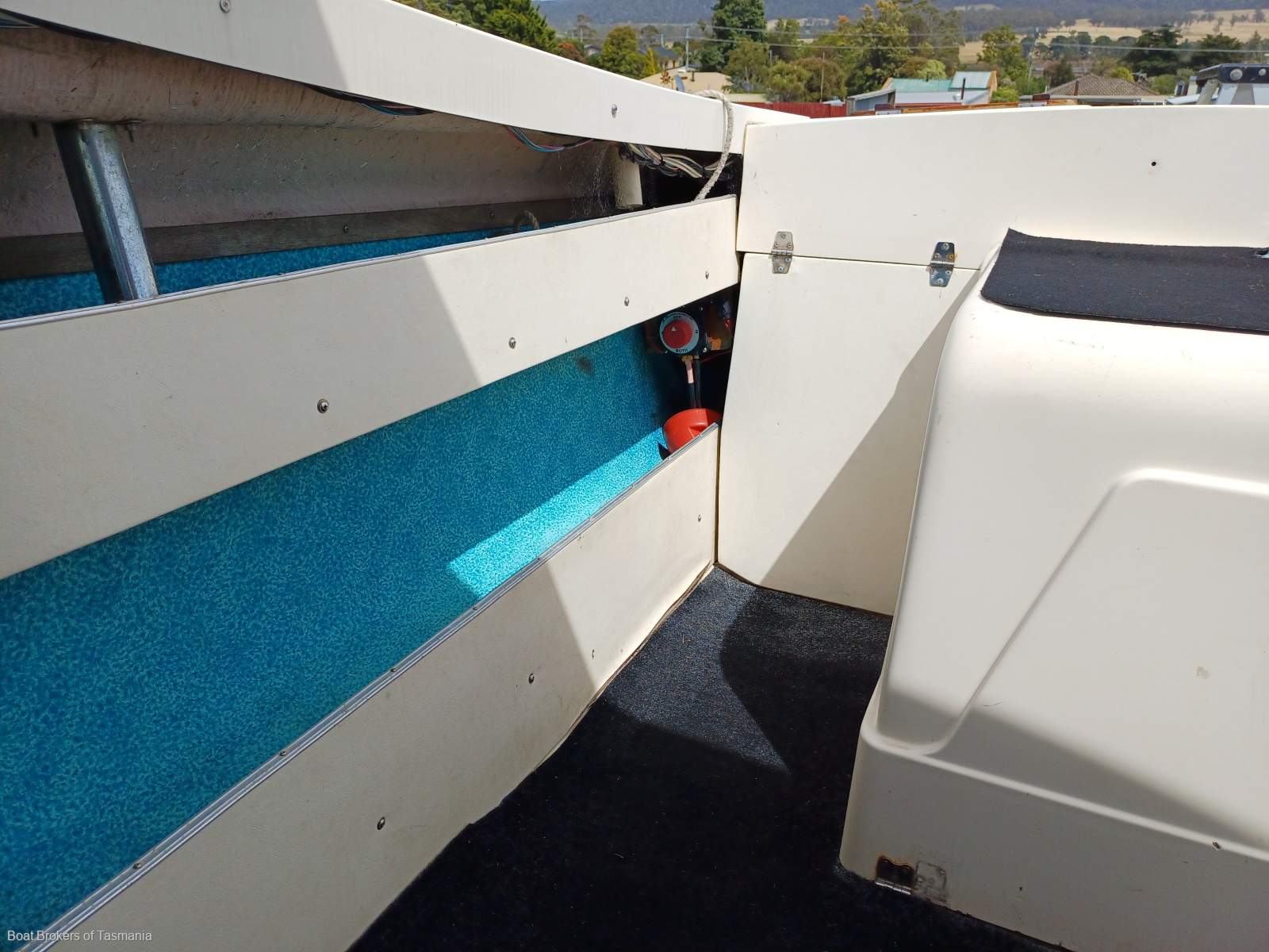 Caribbean Reef Runner 21. Only 7 engine hours on late model Mercruiser. Boat Brokers of Tasmania