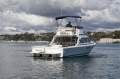 Caribbean 26 Flybridge Cruiser With Optional Floating Dock