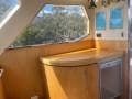 Precision Cruisers Precision 50 PRECISION 50 ENCLOSED FLYBRIDGE CRUISER