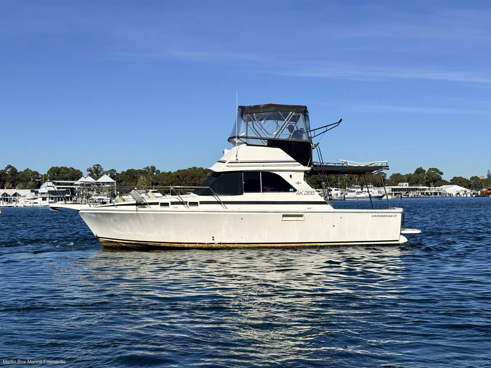 Caribbean 35 Flybridge Cruiser With Updated Mezzanine Galley