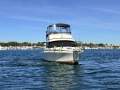 Caribbean 35 Flybridge Cruiser With Updated Mezzanine Galley