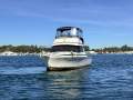 Caribbean 35 Flybridge Cruiser With Updated Mezzanine Galley