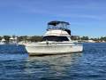 Caribbean 35 Flybridge Cruiser With Updated Mezzanine Galley