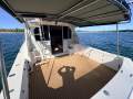 Caribbean 35 Flybridge Cruiser With Updated Mezzanine Galley