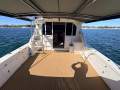 Caribbean 35 Flybridge Cruiser With Updated Mezzanine Galley