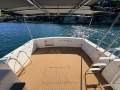 Caribbean 35 Flybridge Cruiser With Updated Mezzanine Galley