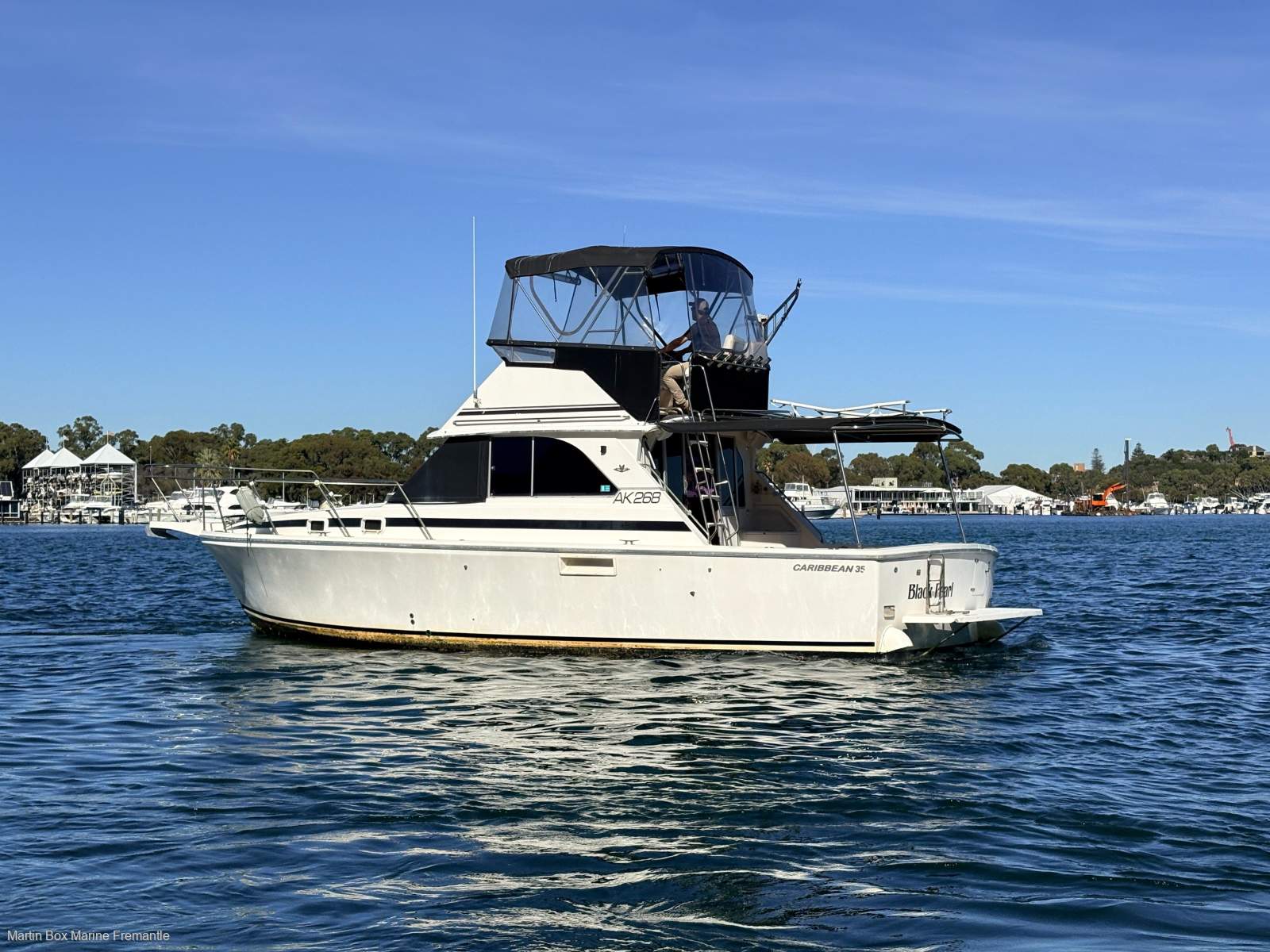 Caribbean 35 Flybridge Cruiser With Updated Mezzanine Galley