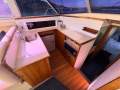 Caribbean 35 Flybridge Cruiser With Updated Mezzanine Galley
