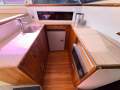 Caribbean 35 Flybridge Cruiser With Updated Mezzanine Galley