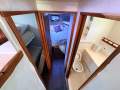 Caribbean 35 Flybridge Cruiser With Updated Mezzanine Galley