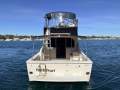 Caribbean 35 Flybridge Cruiser With Updated Mezzanine Galley