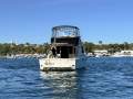 Caribbean 35 Flybridge Cruiser With Updated Mezzanine Galley