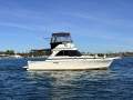 Caribbean 35 Flybridge Cruiser With Updated Mezzanine Galley