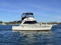 Caribbean 35 Flybridge Cruiser With Updated Mezzanine Galley