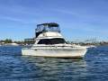 Caribbean 35 Flybridge Cruiser With Updated Mezzanine Galley