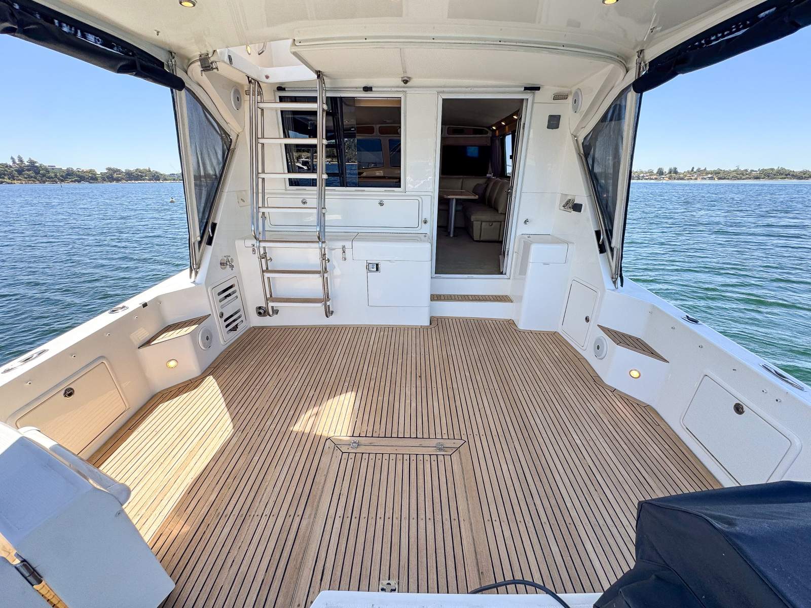 Riviera 48 Enclosed Flybridge For Sale | Oceaneer Marine