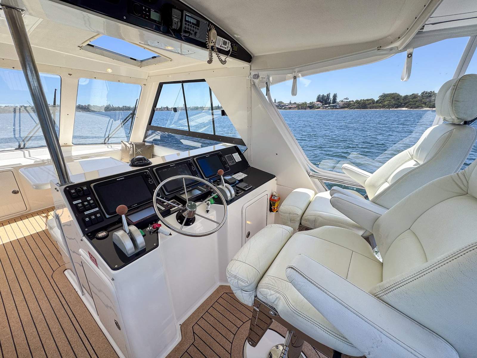Riviera 48 Enclosed Flybridge For Sale | Oceaneer Marine