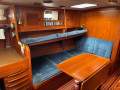 Hallberg-Rassy 42 Superb comfortable blue water cruiser:saloon with port king single berth