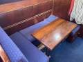 Seabreeze 35 Cruising Yacht (Full Keel):Dinette on port side - table folds down to make a double bed