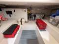 Bertram 570 Convertible:Aft engine space Gen/desal