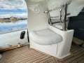 Protector 8.50 Cabin "BOATHOUSE STORAGE ":Ports Side aft facing Seat