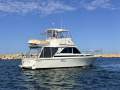 Caribbean 35 Flybridge Cruiser With Brand New ONAN Genset