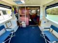 Markline 1000 Deluxe Flybridge Cruiser