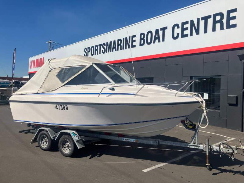 Statesman 595 Cabin Cruiser Boat, Motor, Trailer Package