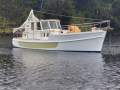 Traditional Tasmanian motor Sailer. Rig removed