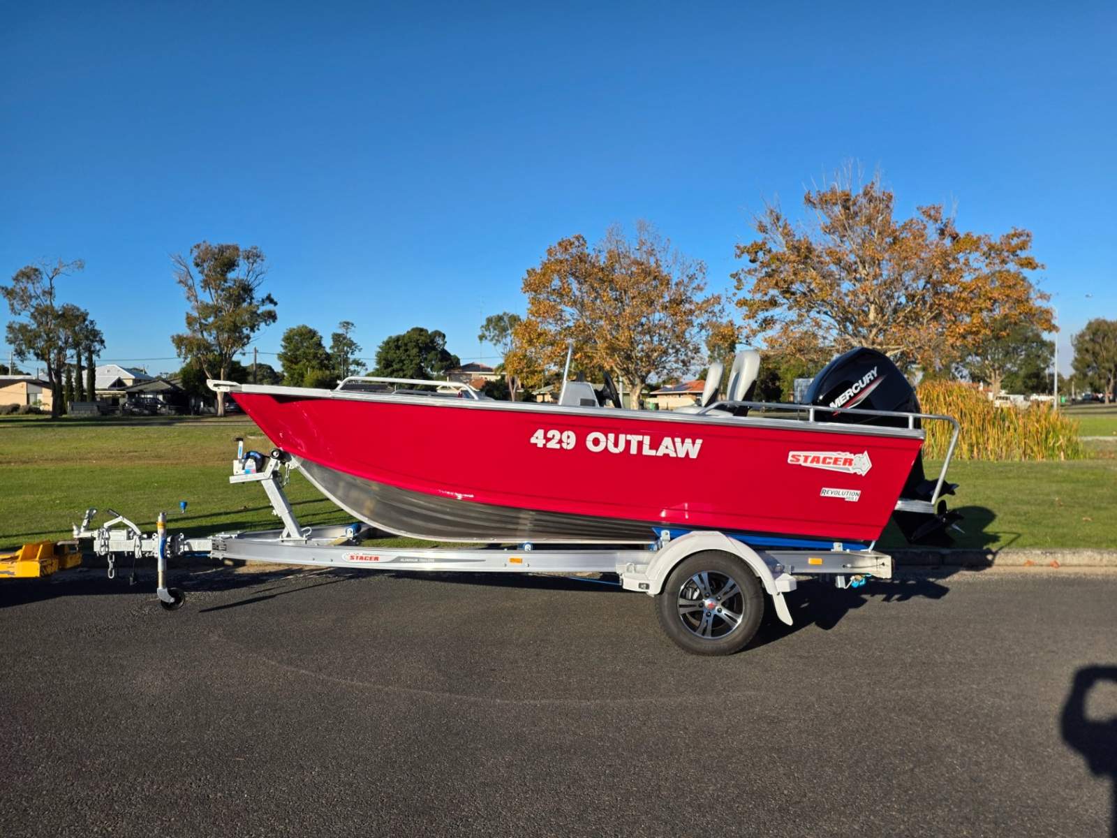 Stacer 429 Outlaw Side Console, 50hp Mercury four stroke & 1098kg alloy trailer