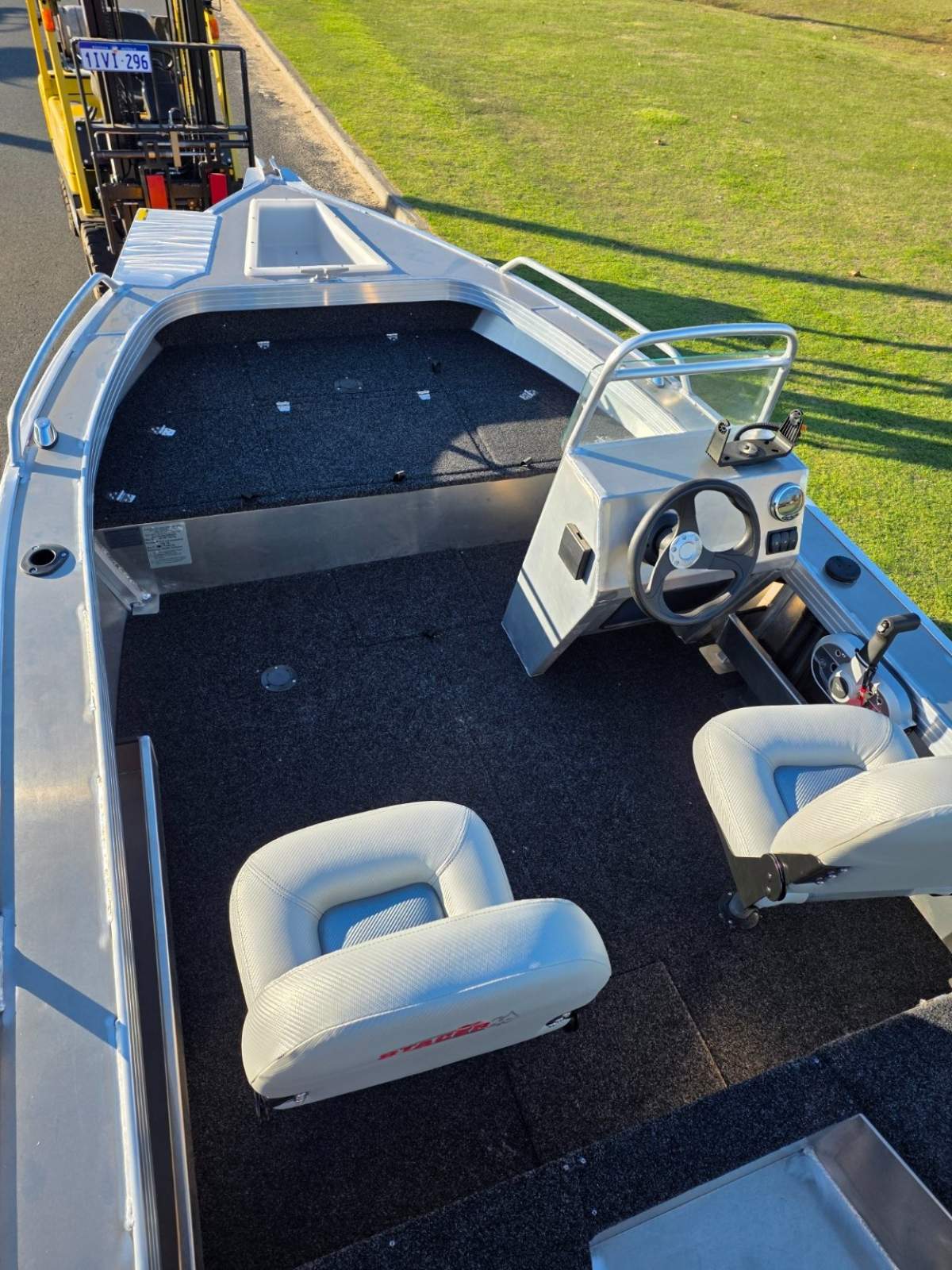 New Stacer 429 Outlaw Side Console, 50hp Mercury four stroke & 1098kg alloy trailer