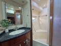 Carver 530 Voyager Once You're Aboard, You Won't Want to Leave:Master stateroom ensuite with vanity, bath and separate toilet