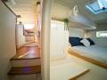 Leopard Catamarans 38 Owner's Version - Pacific Located 2026:Port stairs and aft cabin