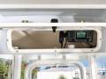 Robalo R242:Overhead locker with VHF
