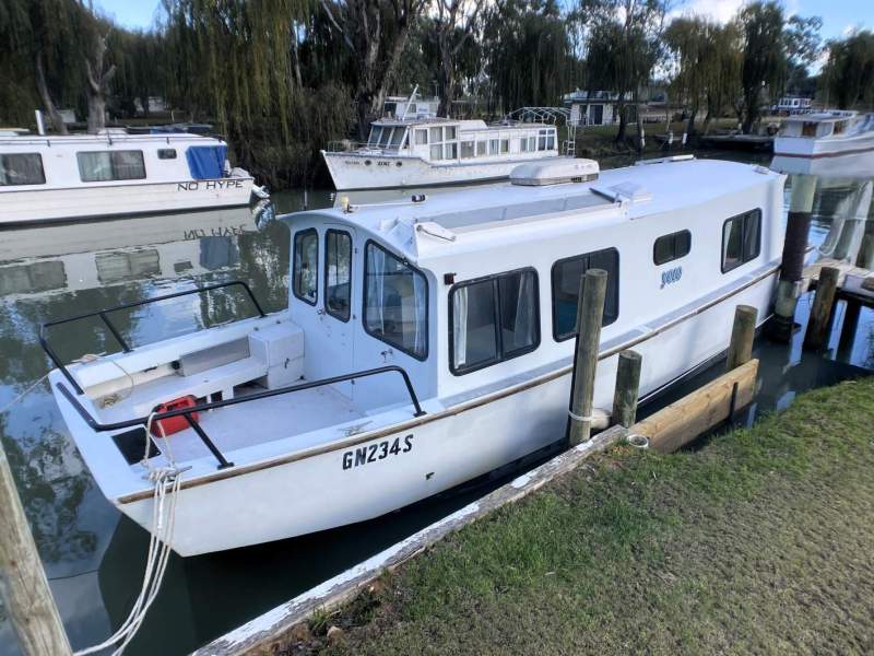 "YOLO". Trailerable Houseboat, One Bed, One Bath.