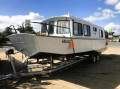 "YOLO". Trailerable Houseboat, One Bed, One Bath.