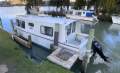 "YOLO". Trailerable Houseboat, One Bed, One Bath.