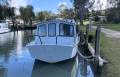 "YOLO". Trailerable Houseboat, One Bed, One Bath.
