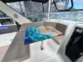 Mustang 3400 Wide Body " NEW ENGINES and TRANSOM PLATES ":Lounge With Unique Table