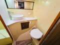 Riviera 38 Flybridge " Dual Helm " Diesel Shaft drives:Bathroom with Electric Toilet