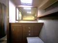 Riviera 38 Flybridge " Dual Helm " Diesel Shaft drives:Starboard Guest mirror and storage
