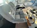 Riviera 38 Flybridge " Dual Helm " Diesel Shaft drives:Flybridge Helm Seat