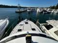Riviera 38 Flybridge " Dual Helm " Diesel Shaft drives:Foredeck view from flybridge