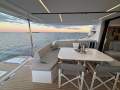 Leopard Catamarans 46:Aft cockpit with Reversible seat and director chairs