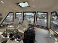 Caribbean 49 Flybridge Cruiser:Custom rear enclosure
