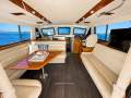 Caribbean 49 Flybridge Cruiser:All leather lounges